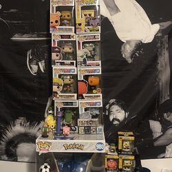 Funko pops and a big greninja one