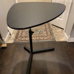 Table with adjustable hight can Be used as side table