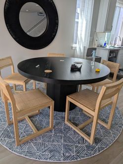 Round dining table with chairs