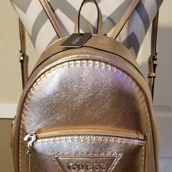 GUESS backpack,adjustable straps. Large front G logo pocket, 'G' logo paper inside