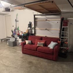 Red Loveseat with Pull-Out Bed – Great for Guests