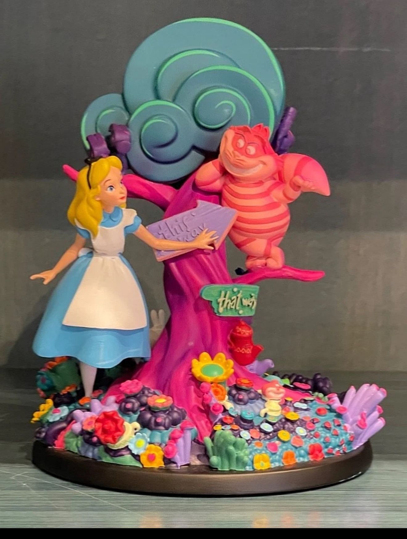 Disney parks Alice in wonderland glow in the dark Figure 
