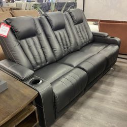 Center Point Black Faux Leather Reclining Sofa w/ Drop Down Table 