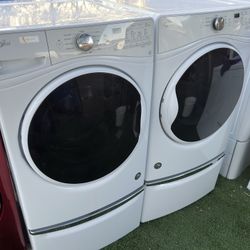 Whirlpool Front Load Washer And Electric Dryer On Pedestals