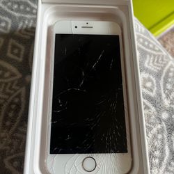 Iphone 6s. Works but screen cracked. 