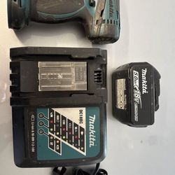 Makita XDT04 Impact Driver with Charger and 18v  5amp Battery