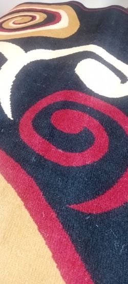 New 5/7 area rug thick and elegant
