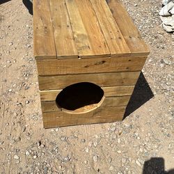 Small dog house on wheels 22 inches long by 19 inches wide and 22 inches high