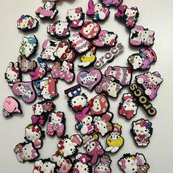 50 Hello kitty croc charms all for $20