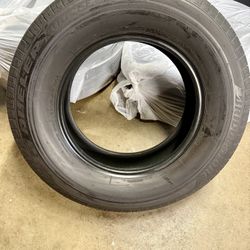 Set of four Bridgestone Duelers size 245/70R17 Only 2K miles on them, like new! 