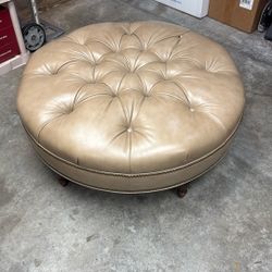 Tan Leather Ottoman / Wood Legs/ Bronze Detail