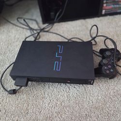 Playstation 2 + 8 games