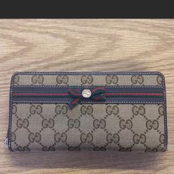 Gucci Monogram Zippy Wallet 