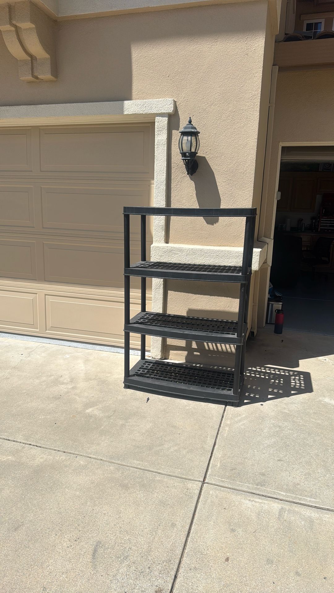 Plastic Storage Rack (Black) Comes Apart In Two Pieces For Easy Pick Up.