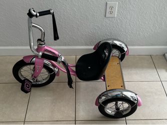Schwinn tricycle for girls. Look the price new Good condition