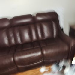 Faux Leather Reclining Chair And Couch And Ottoman