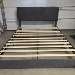 Brand New Queen Grey Upholstered Platform Bed Frame Only.

$175