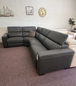 NEVIO - four pc leather sectional with 2 power recliners & articulating headrest