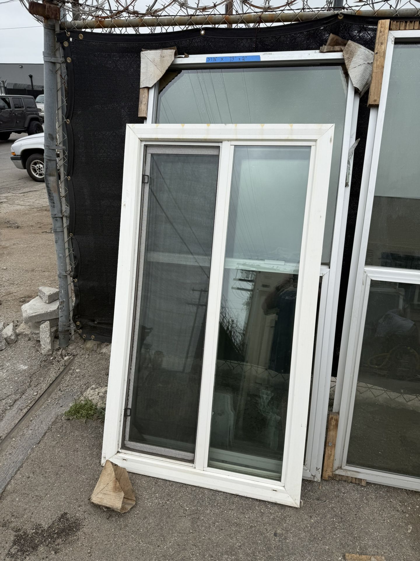 Assorted Vinyl And Aluminum Windows And Doors