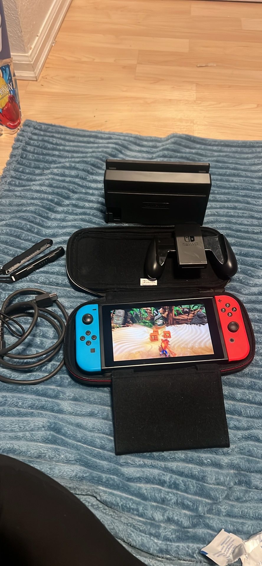 Nintendo switch with crashing N Sane Trilogy  game, docking station, joycon grip and hdmi