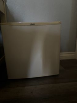 White mini fridge