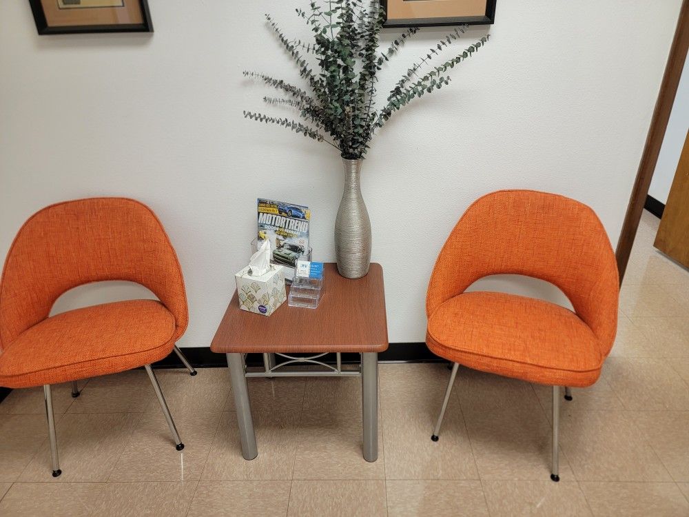 2 Chairs And A Small Table