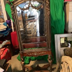 Curbio cabinet 18-19 century baroque style ornate Victorian era European craftsmanship has two glass shelves museum quality likely brass or gold leaf 