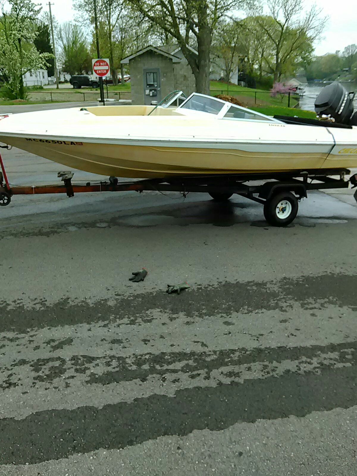 A 16 ft. checkmate boat 65hp mercury motor, winter sale.