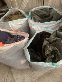 4 garbage bags women’s clothes