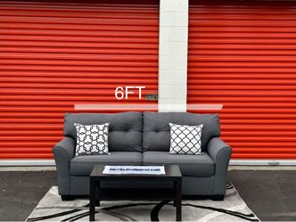 Ashley furniture grey sofa with pull out bed