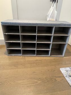 Shoe storage bench with cushion