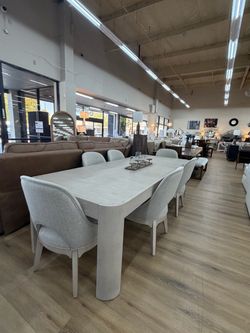 Light Wood Dining Table with 6 Upholstered Chairs
