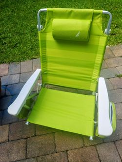 Nautical reclining lime green beach chair with 2 storage  pockets on each side and head rest