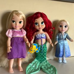 3 disney dolls rupunzel 15”in tall /Elsa13” in tall/ Ariel 15”in tall/ both in good condition$15.00each one