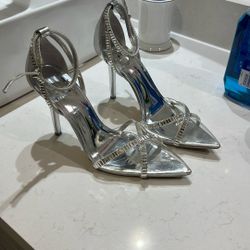 Jlo. Silver And Clear Heels