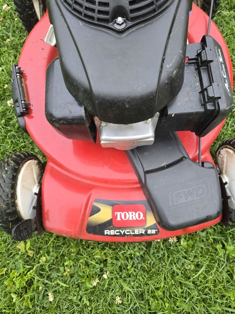 Lawn mower for sale. It works very well, it has been used very little, and it has the Hyundai badge on it.