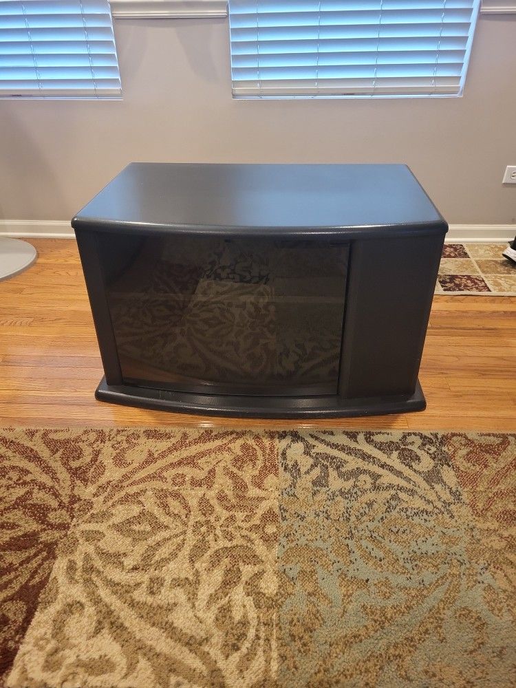 Black TV Stand . With Glass Door And Storage
