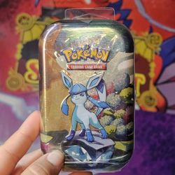 Prismatic Evolutions Tins