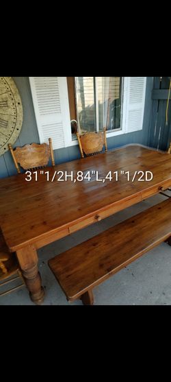 Table and bench with chairs