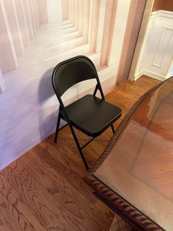 Black Metal Folding Chairs — Set of 4 — $70