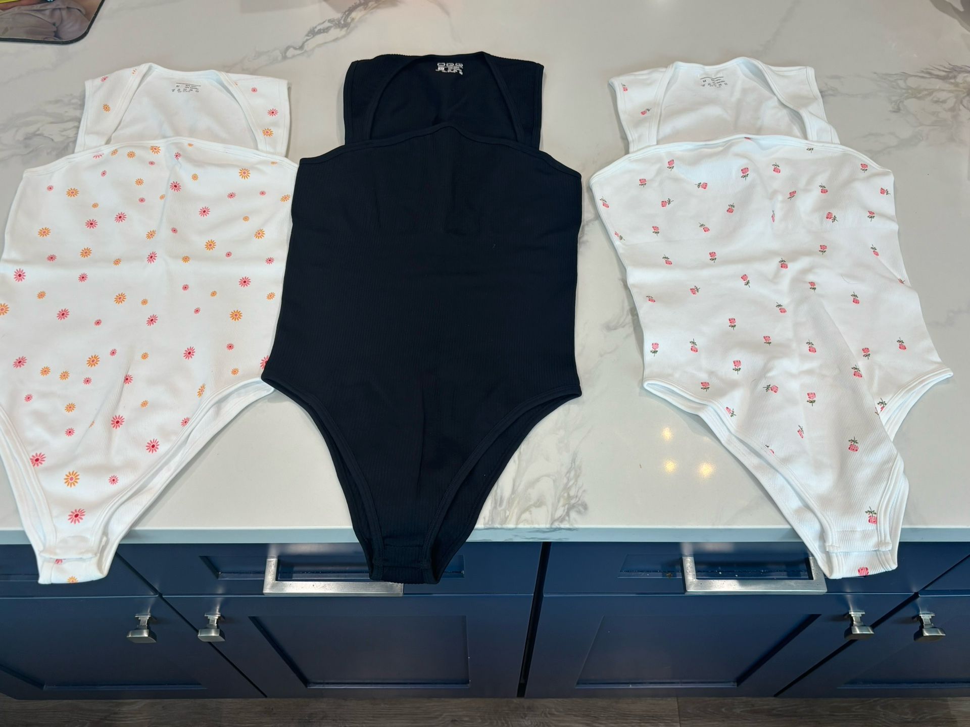 Brand new bodysuits women's size medium . Never worn. $8 for all 3
