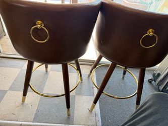 Set of two counter-height barstools, PU leather, 360 degree swivel, brown—$100 for the pair