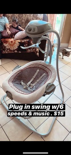 Plug in mobile swing