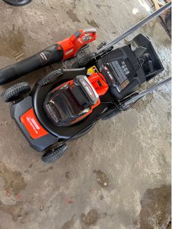 Echo lawnmower new self propelled battery and charger blower