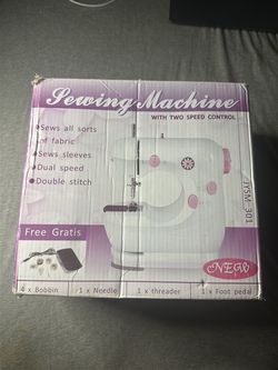 White and purple mini sewing machine