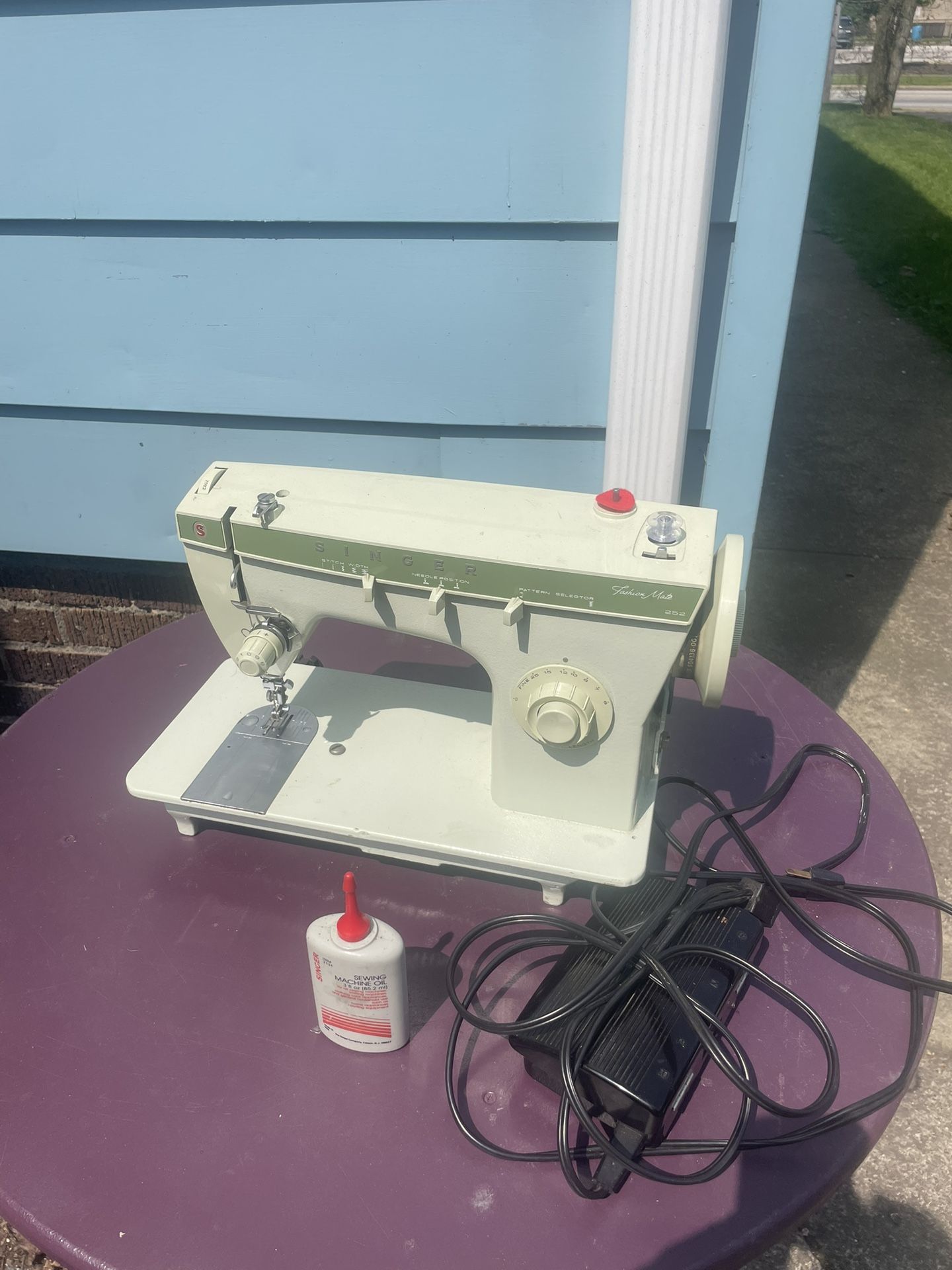 Singer sewing machine & Supplies
