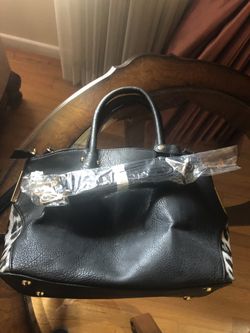 Black purse w leopards decorated sides new never used