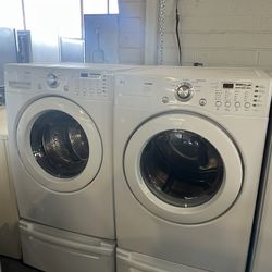 LG Washer & Electric Dryer with Pedestals