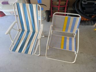 2 folding beach chairs