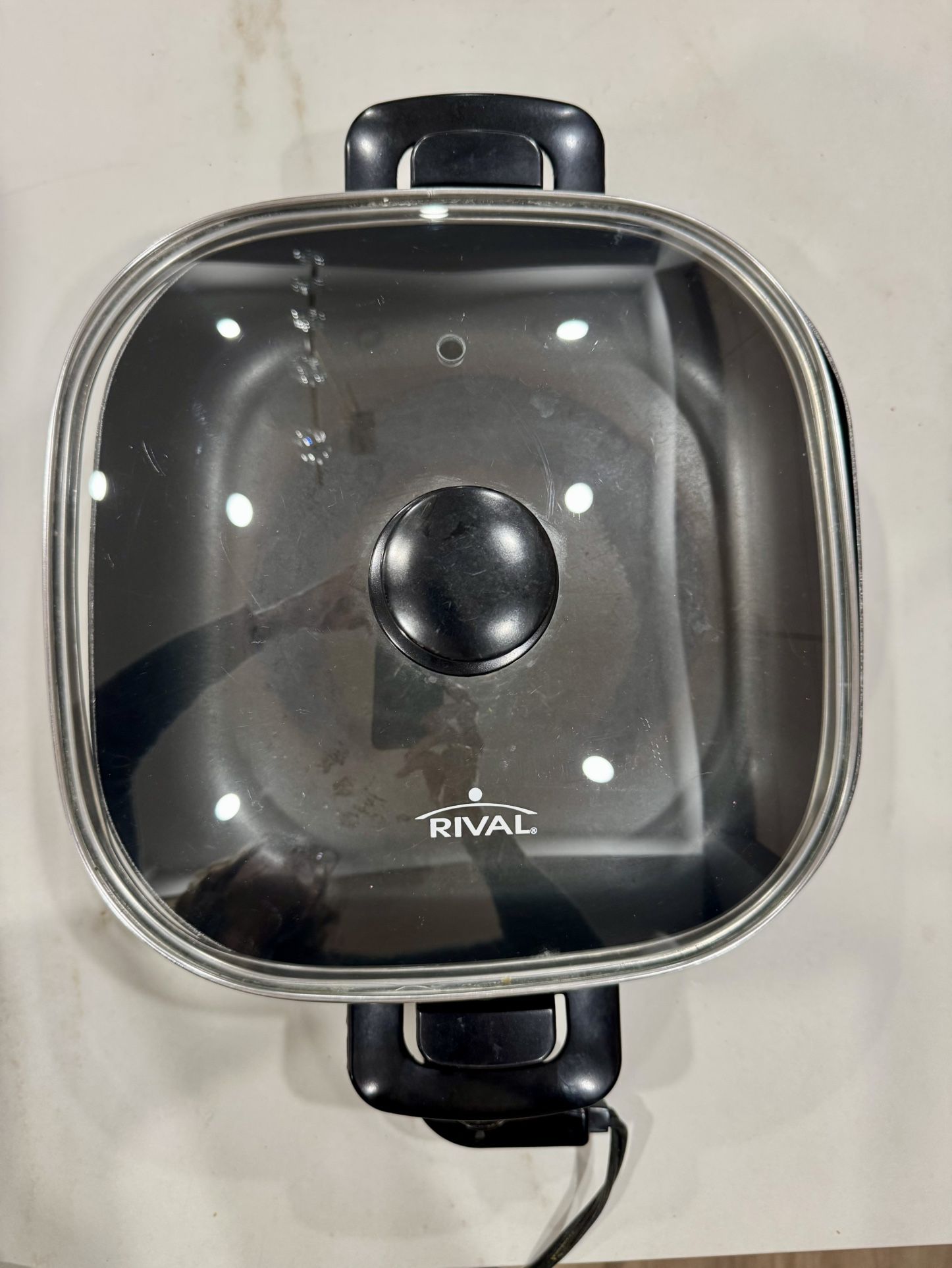 Rival S11P nonstick square electric skillet with a glass lid.
